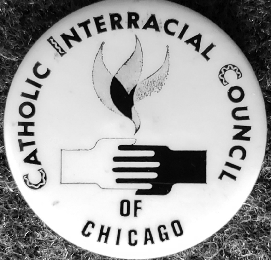 [Catholic Interracial Council pin]