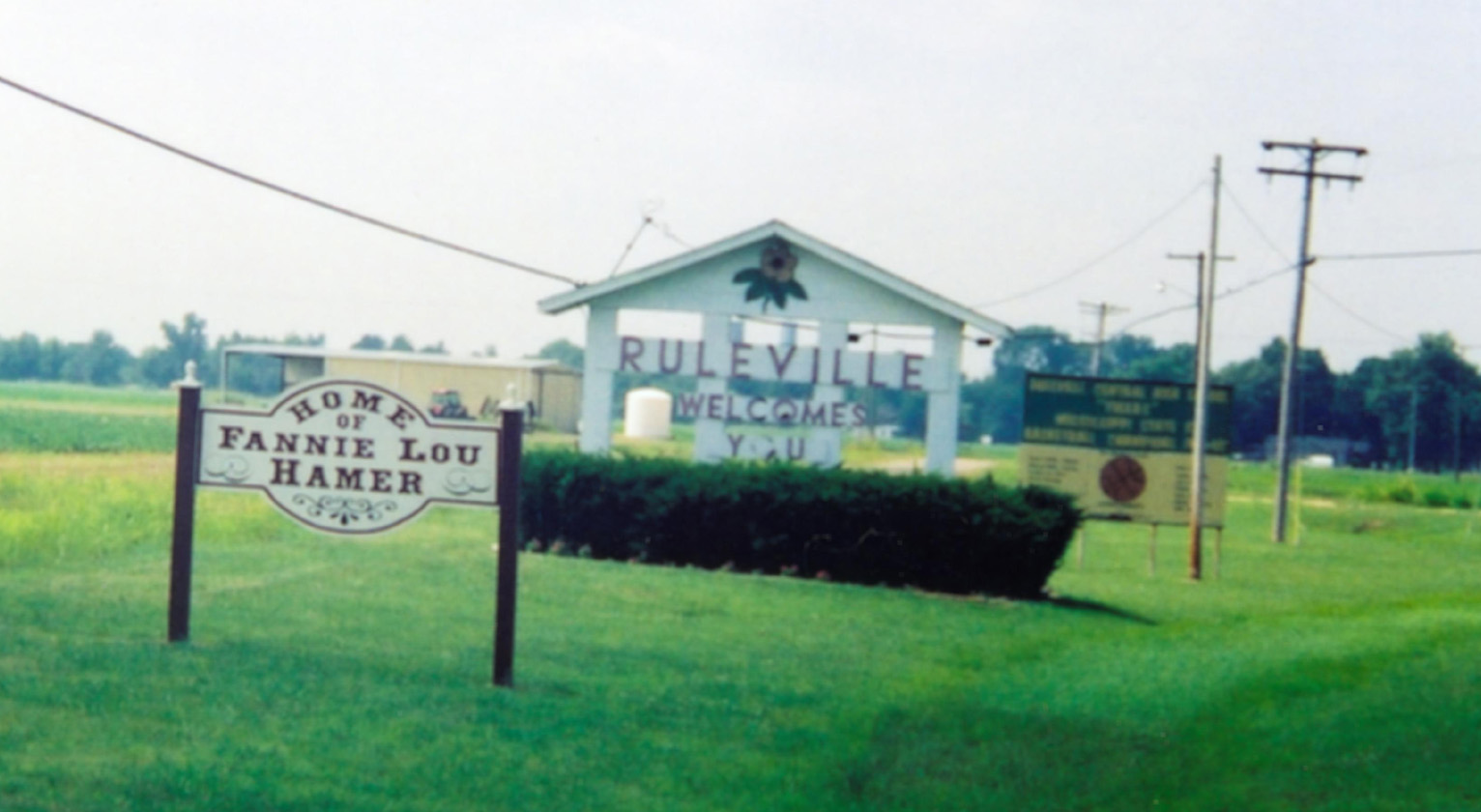 [Sign at entrance to 
Ruleville, photo by Wallace Roberts]